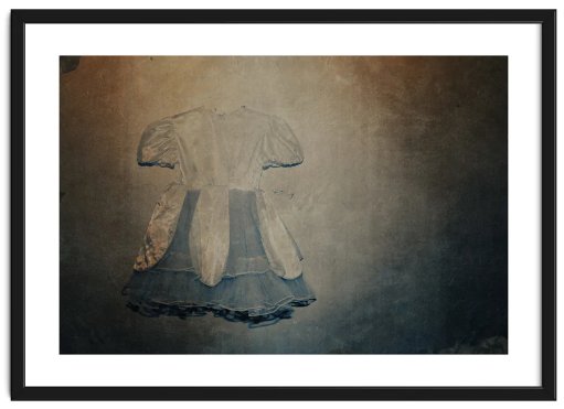 Framed dreamlike faded image of a girls dress against a decaying wall